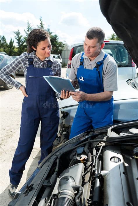 2 Mechanics Inspecting Vehicle Stock Photo Image Of Check Automotive