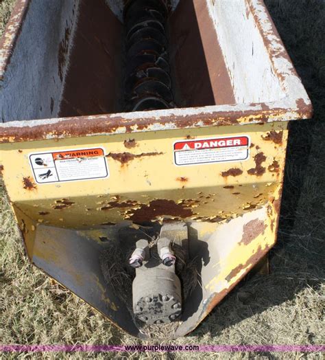 Concrete auger bucket in Shawnee, KS | Item 4697 sold | Purple Wave