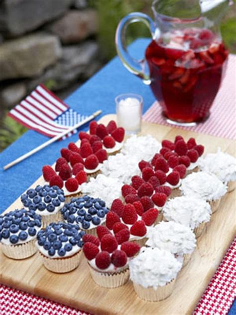 A runner of neatly pressed bandannas in hues of blue and white looks top your july 4th tablescape with a few patriotic decorations—like these homemade candleholders and vases. 13 Cool Ideas of 4th of July Table Decorations | DigsDigs