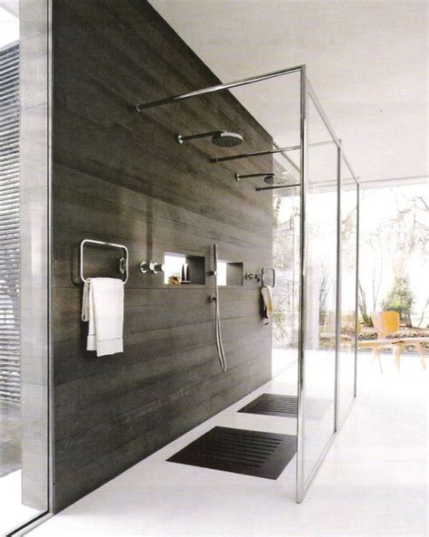 The 'bath' side has a tub in one corner and a shower in the other. 25 Incredible Open Shower Ideas