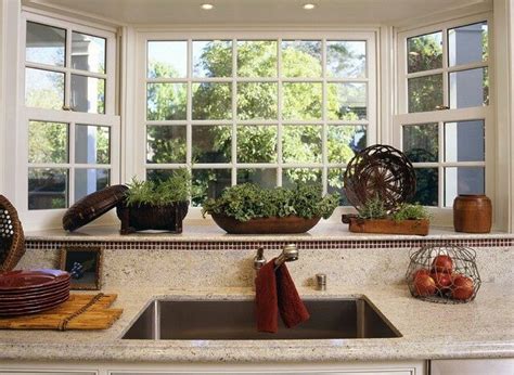 Ideas for decorating a kitchen bay window advertisement with some simple decorations you can make your kitchen bay window look even more attractive and appealing. bay window over kitchen sink in small kitchen - Bing ...