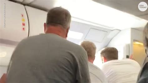 frontier airlines passenger opens cabin door deploying emergency slide