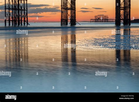 Sunset On Brighton Beach East Sussex England Stock Photo Alamy