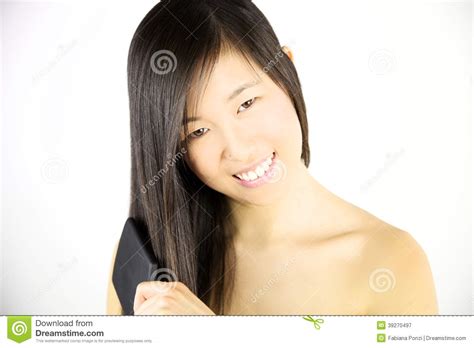 Beauty Portrait Of Asian Woman Brushing Long Hair Stock Image Image