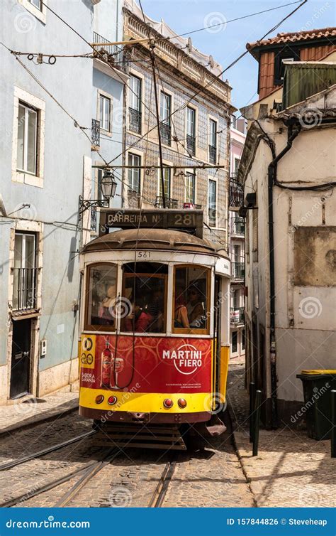 Trolley Or Tram On Famous Route 28 In Alfama District Of Lisbon