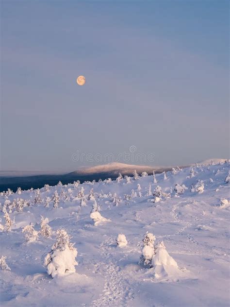 Red Full Cold Moon Over A Snow Covered Slope Winter Polar Landscape