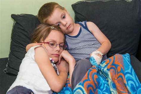 brother and sister watch tv stock image image of indoors enjoyment 129835021
