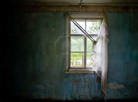 Inside Abandoned House View On Broken Window With Curtain Grunge