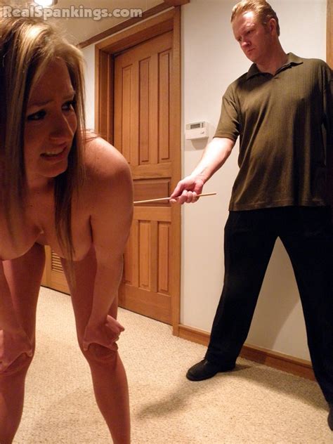 Real Spankings Caned Naked In The Hallway Photos