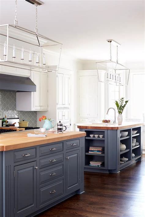 I have put together a list of my favorite blue paint colors and gathered 23 gorgeous blue kitchen cabinet ideas to inspire you. Blue Gray Kitchen Islands with Maple Butcher Block ...