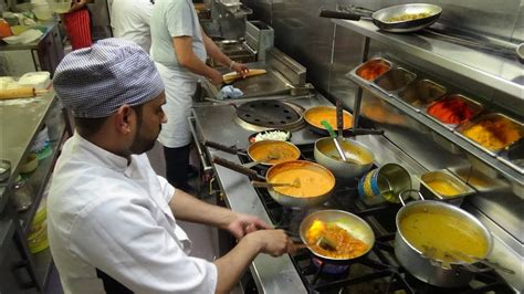 The Heat Of The Curry Master S Kitchen On A Busy Friday Night At