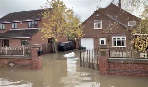 uk flooding video watch as entire village swamped by river don in horrific scenes weather