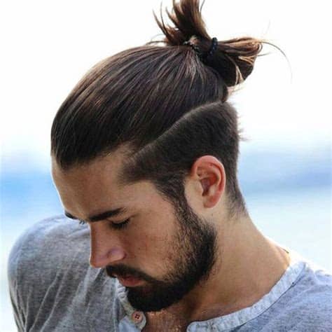 An asian man donning a tiny bun hair looks likable. 19 Samurai Hairstyles For Men | Men's Hairstyles ...