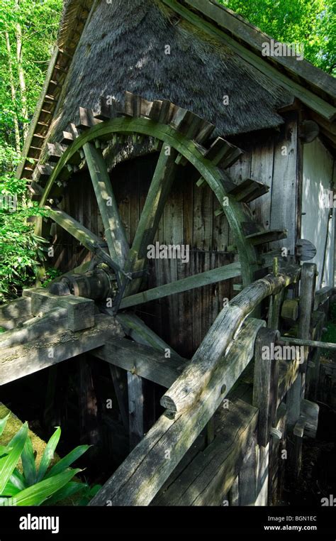 Old Wooden Water Wheel Of Watermill In Forest At The Open Air Museum