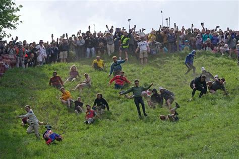 Cheese Rolling Contest Pictures Showing How Crazy The Gloucestershire