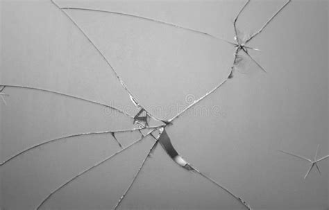 Broken Mirror Shattered In Many Pieces Cracked Glass The Mirror Crack Texture Background Stock