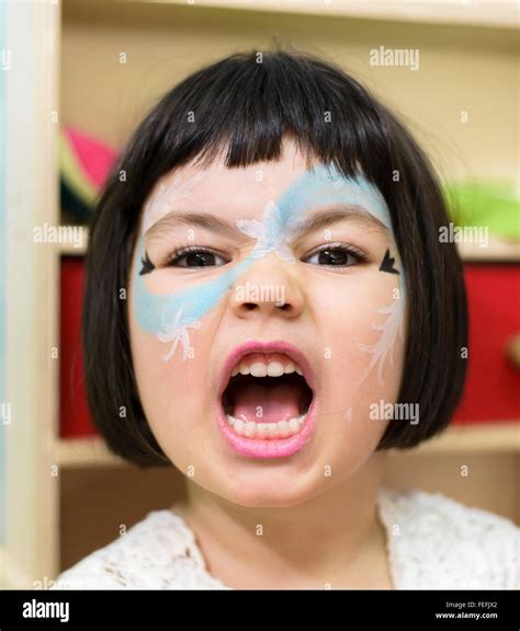 Little Girl With Creative Face Stock Photo Alamy