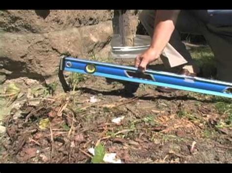 Then dig out and remove large rocks and debris in the lawn. Proper grading around your home- how to measure | Yard drainage, Landscape drainage, Foundation ...