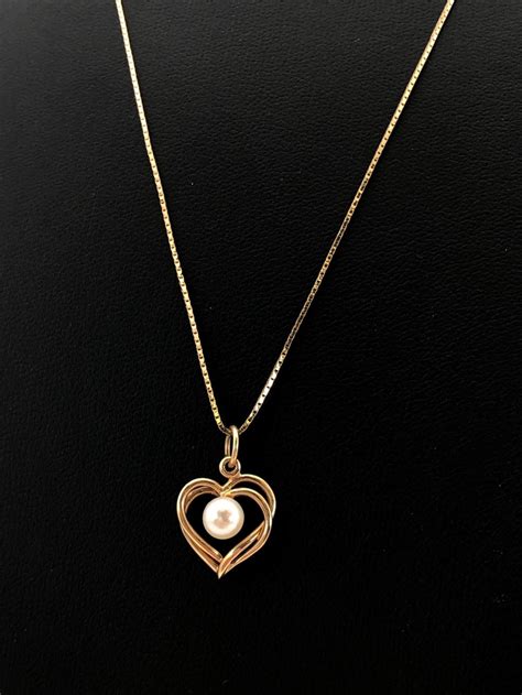 Check spelling or type a new query. Lot - 14K Gold Necklace 10K Gold Pearl Heart Pendant