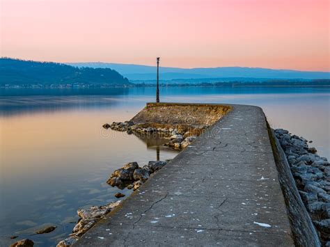 Pier At The Lake Murtensee At Sunset Stock Image Image Of Scenic