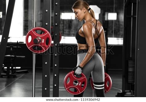 Sexy Athletic Girl Working Out In Gym Fitness Woman Doing Exercise Beautiful Butt In Legging