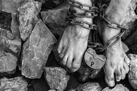 Slave Chained To Wall