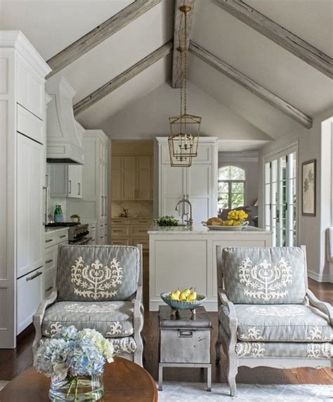 Vaulted ceilings are relics of the old days with a grand allure to them that still manage to thrive in our relatively mundane modern spaces. Remodeled White Kitchen with Vaulted Ceiling Beams - Home ...