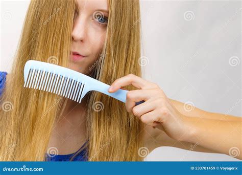 Woman Combing Long Healthy Blonde Hair Stock Image Image Of Smooth