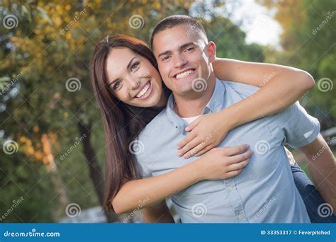 Mixed Race Romantic Couple Portrait In The Park Royalty Free Stock