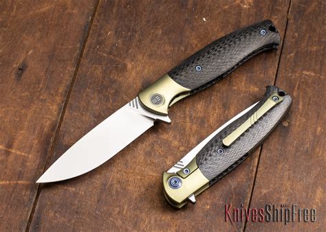 We Knife 901 Deacon Gold Titanium Framelock Carbon Fiber M390