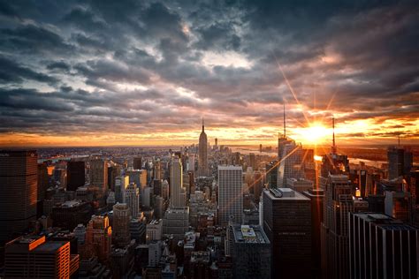 Download 3600x2400 New York Sunset Dark Clouds Buildings Cityscape