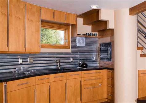 It gives a nice, clean finish and kept our edges level did you caulk between the tile and metal edge, or is that grout? Awesome corrugated metal backsplash | Unusual metal ...