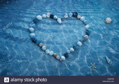 Heart Made Of Shells In Pool Stock Photo Alamy