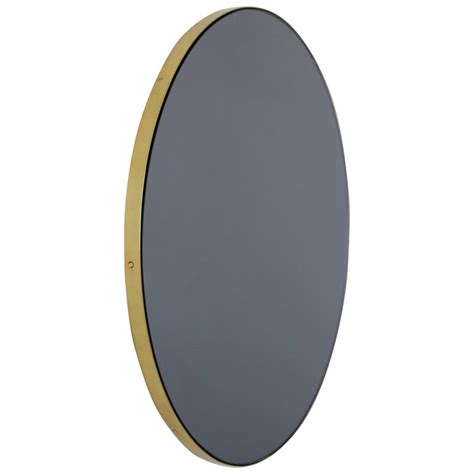 Modernist Black Tinted Orbis™ Round Mirror With Brass Frame Medium