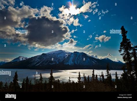 Frozen Tagish Lake And Mountains Carcross Yukon Canada Stock Photo