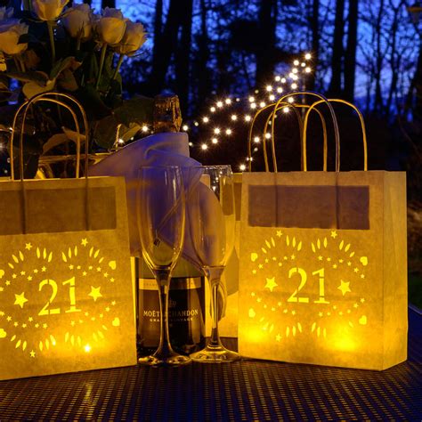 Home goods and stylish accessories and apparel are also good choices as this is about the age most men are branching out to live on their own and starting careers. 21st Birthday, Party Decoration Lantern Bag By Baloolah ...