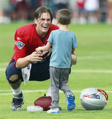 Tom Bradys Oldest Son Tom Brady Showers His Sons With Kisses—see The