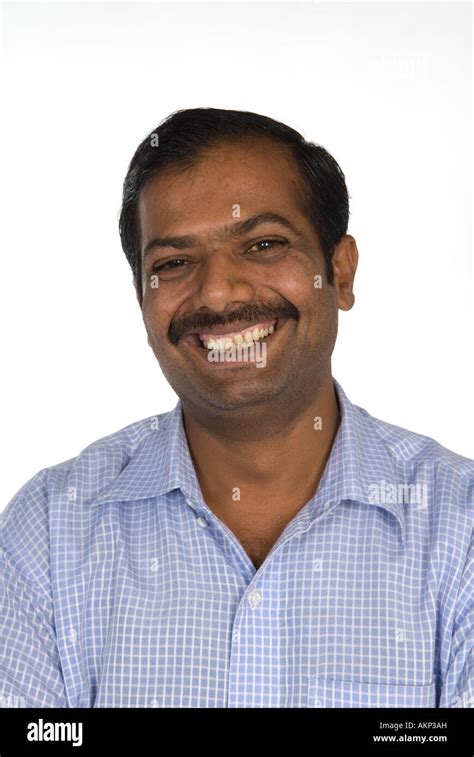Portrait Of A Happy Mature Indian Man Stock Photo Alamy