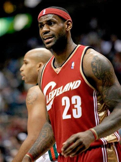 One reporter gives five reasons why LeBron James will stay in Cleveland, and another gives 