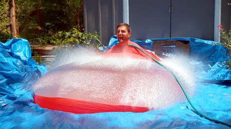 Giant Exploding Water Balloon In Slow Mo On The Feed Cbs News