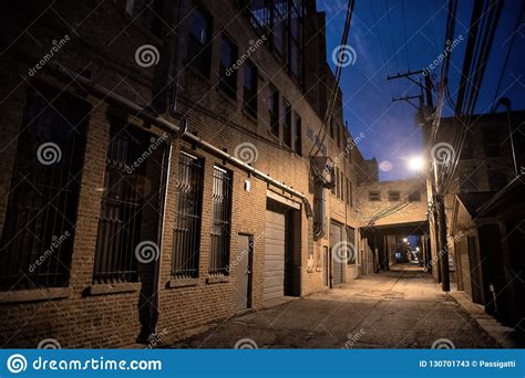 Dark And Scary Downtown Urban City Street Alley Scene At Night Stock