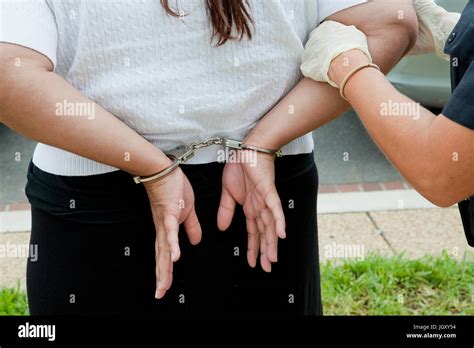 Woman Arrested Rear View Hi Res Stock Photography And Images Alamy