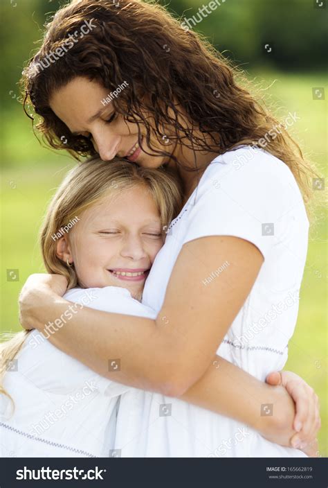 Mother Teenage Daughter Hugging Smiling Together Stock Photo 165662819