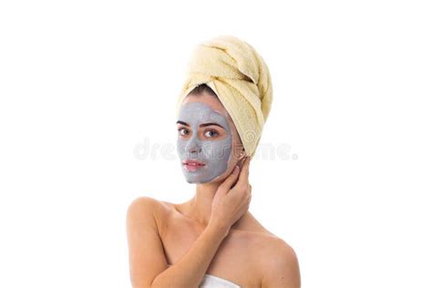 woman with towel on her head and cosmetic mask on her face stock image image of healthy hair