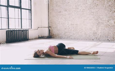 Exercises Of Yoga Are Lying And Sitting On The Mat Stock Image Image