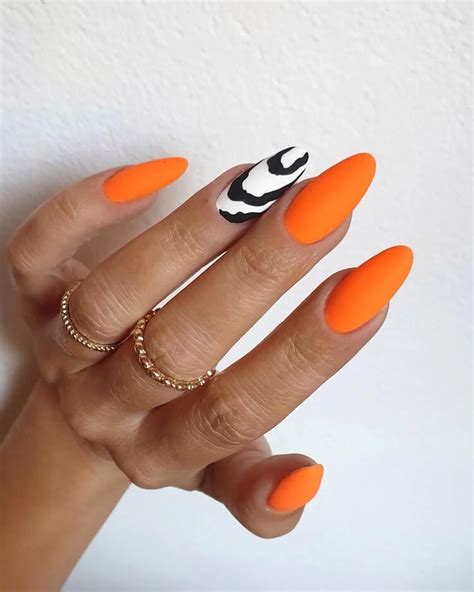 The List Of 12 Orange And White Nail Designs