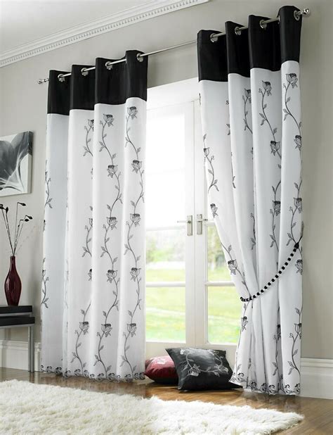 Style your windows and doors in eyelet and pencil pleat, while combination of white with grey, black and blue embraces elegance. BLACK WHITE FLORAL ROSE 58X72" (147x183CM) LINED RING TOP ...