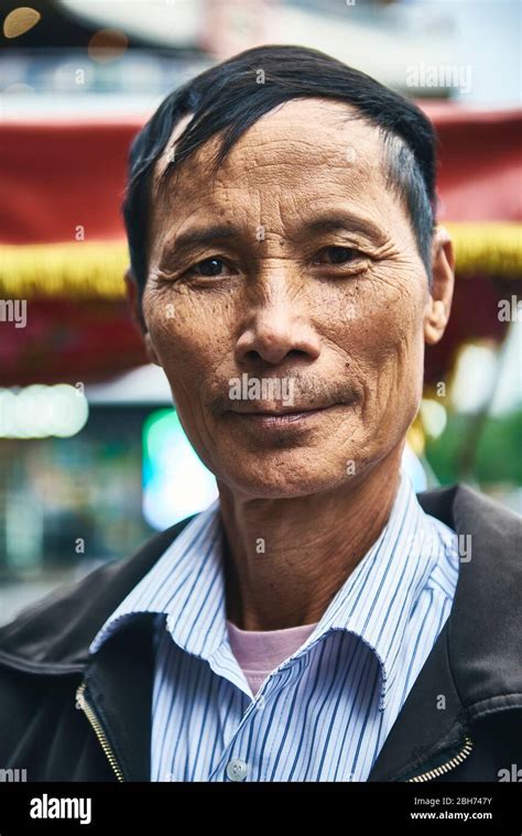 Vertical Portrait Of Vietnamese Mature Man Stock Photo Alamy