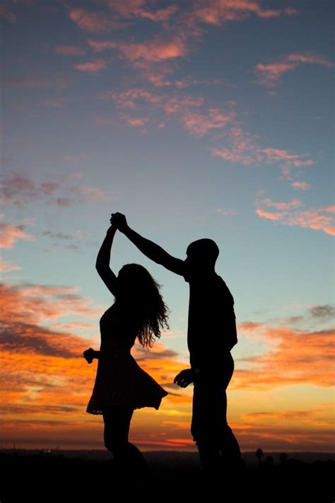 Dancing And Twirling Into The Sunset A Beautiful Engagement Silhouette