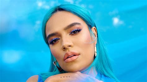 Karol G Reveals The Meaning Behind Her Barbed Heart Tattoo — Interview Verve Times